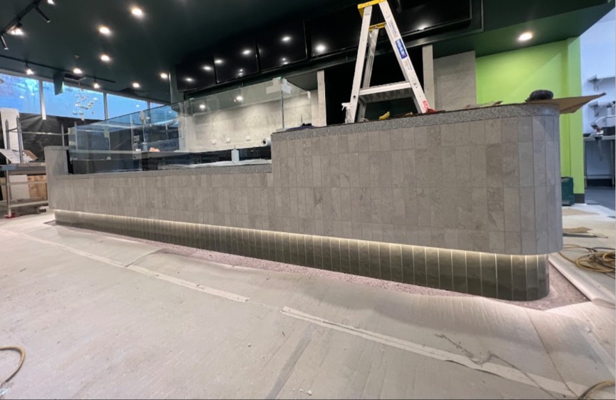 Tiled commercial service counter with LED lighting